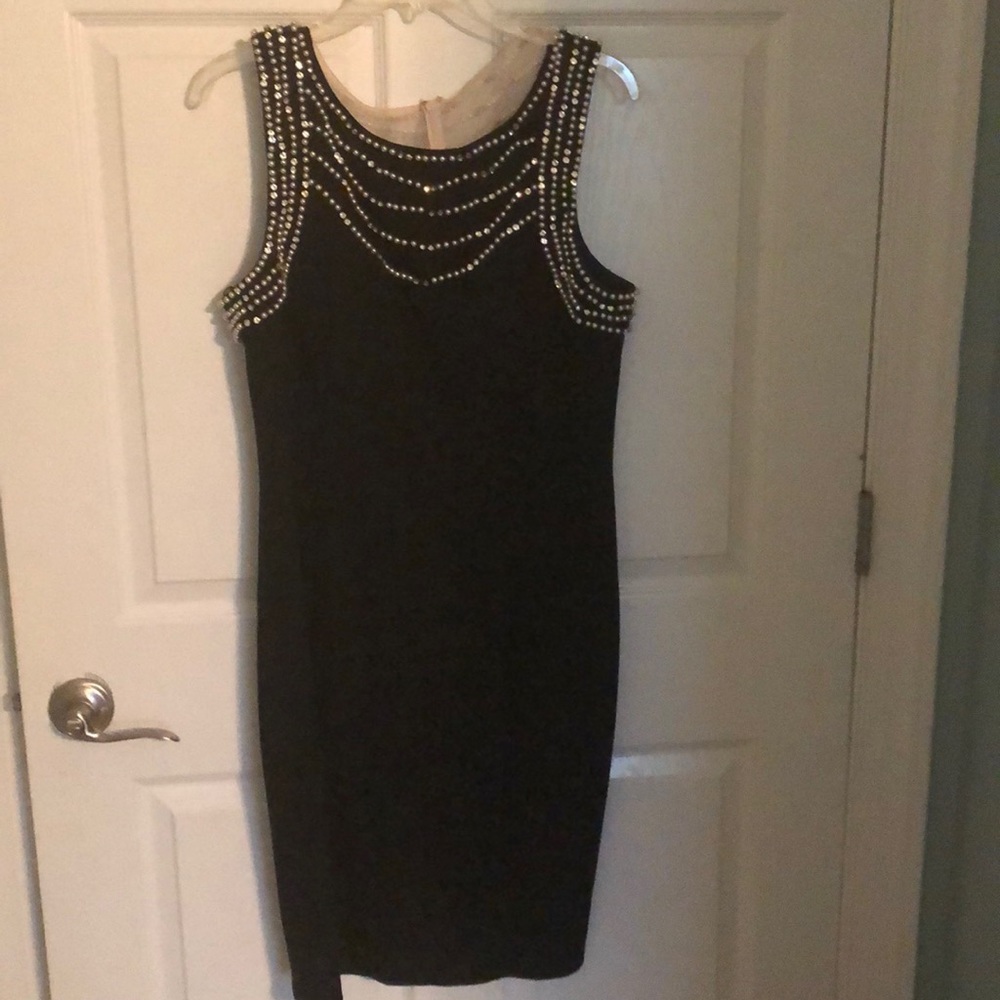 A black formal dress with pearl and rhinestones